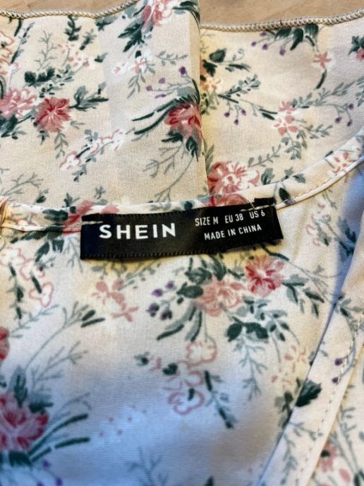 shein temu blå kors